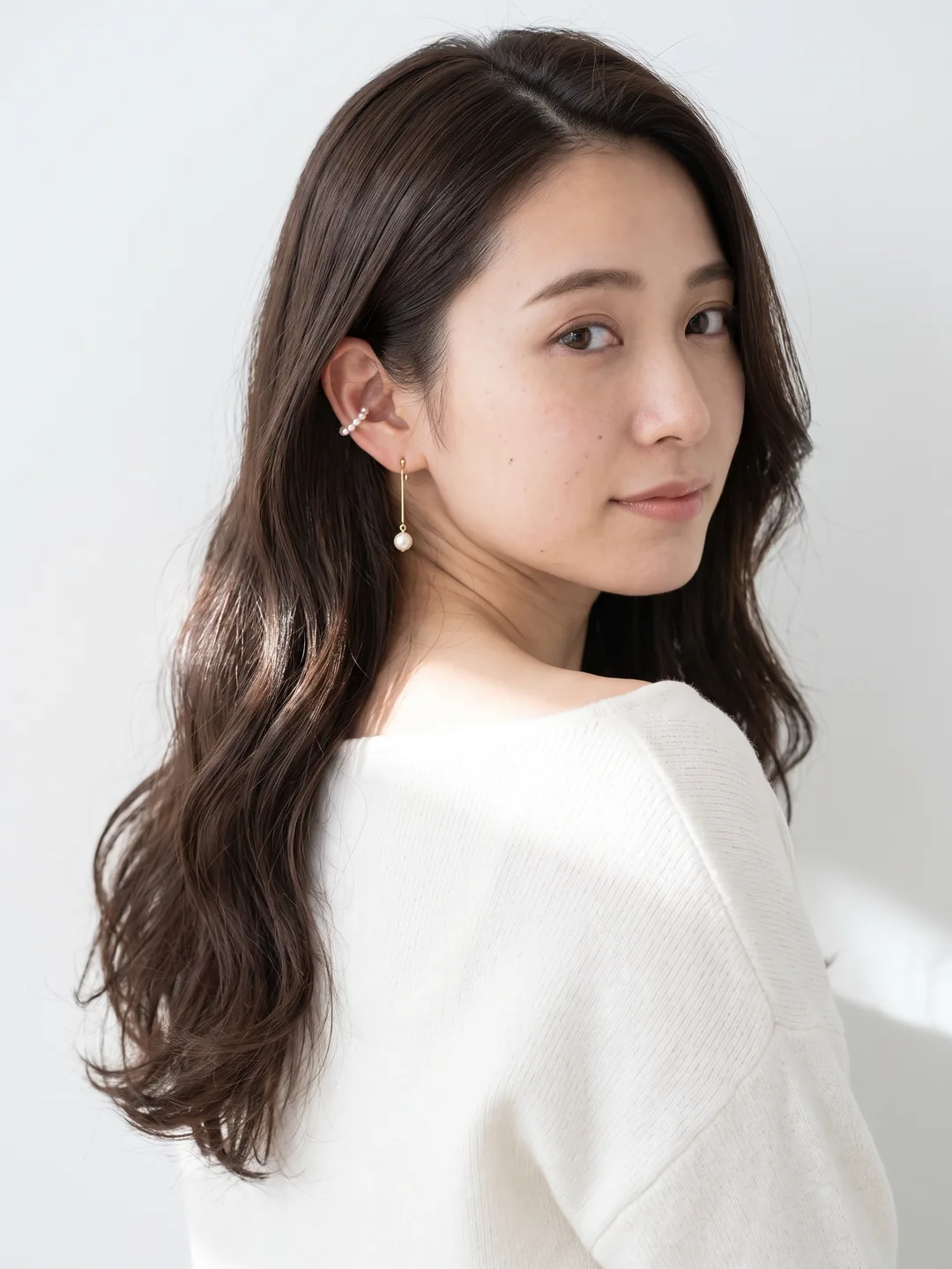 ダークモカのロング。艶のあるゆるい巻き髪